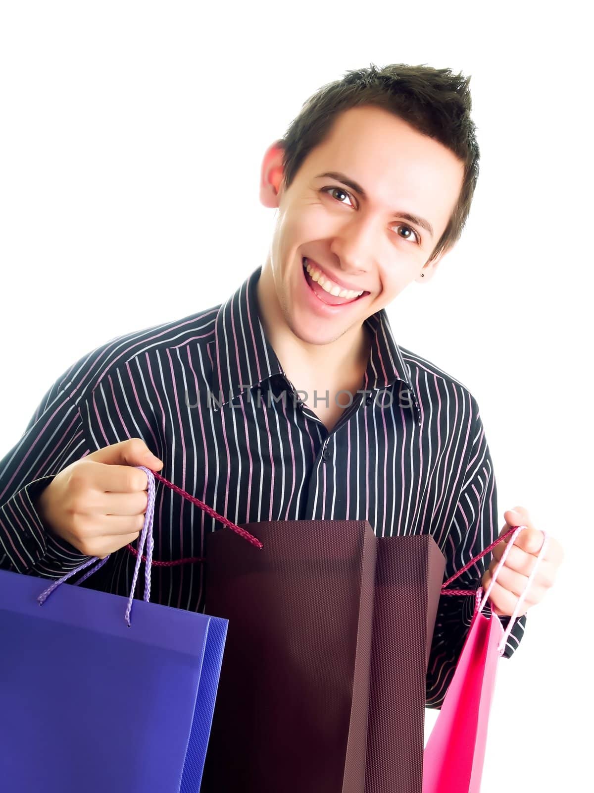 Young man holding shopping bags