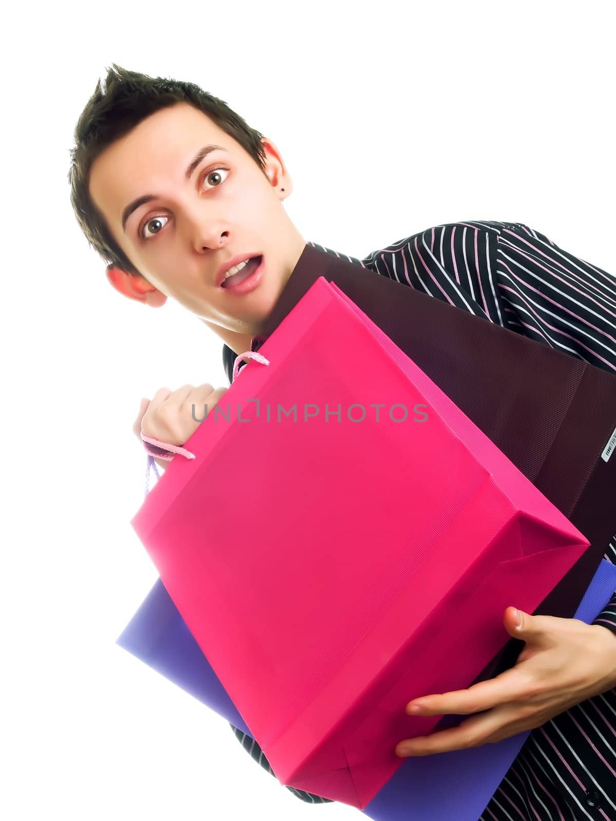 Young man holding shopping bags