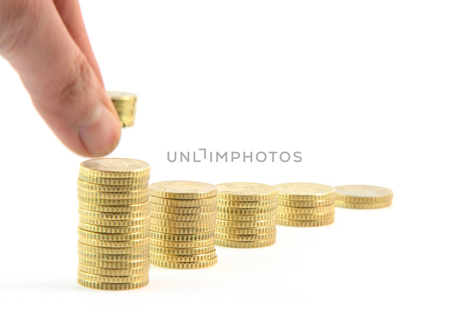 adding to stacks of fifty euro cents in a row isolated on white background business and finance concepts