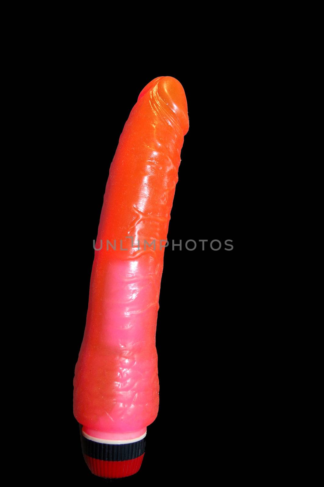 Big red dildo in black background