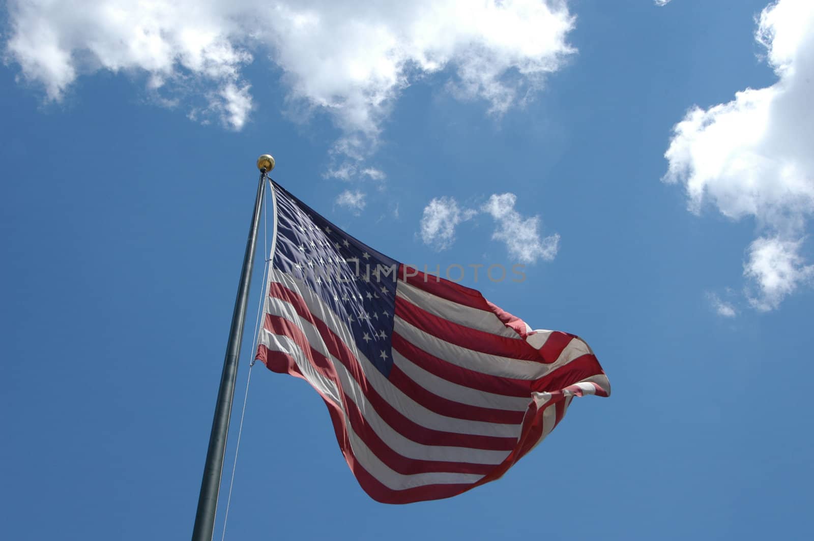 Flag in the breeze by northwoodsphoto