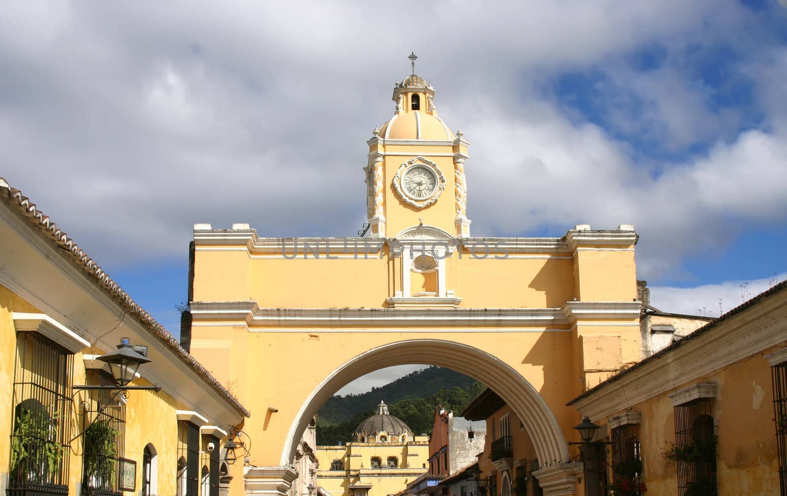 Yellow arch in old capital of Guatemala over sky