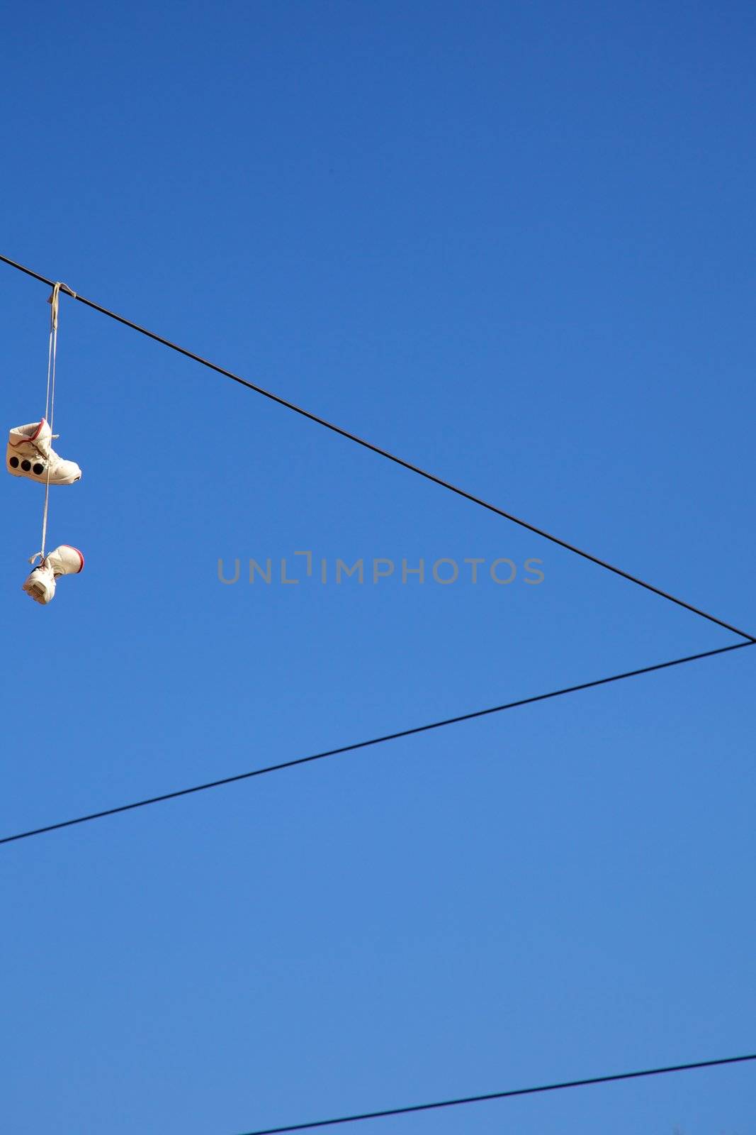 Shoes on cable, alone, desolate