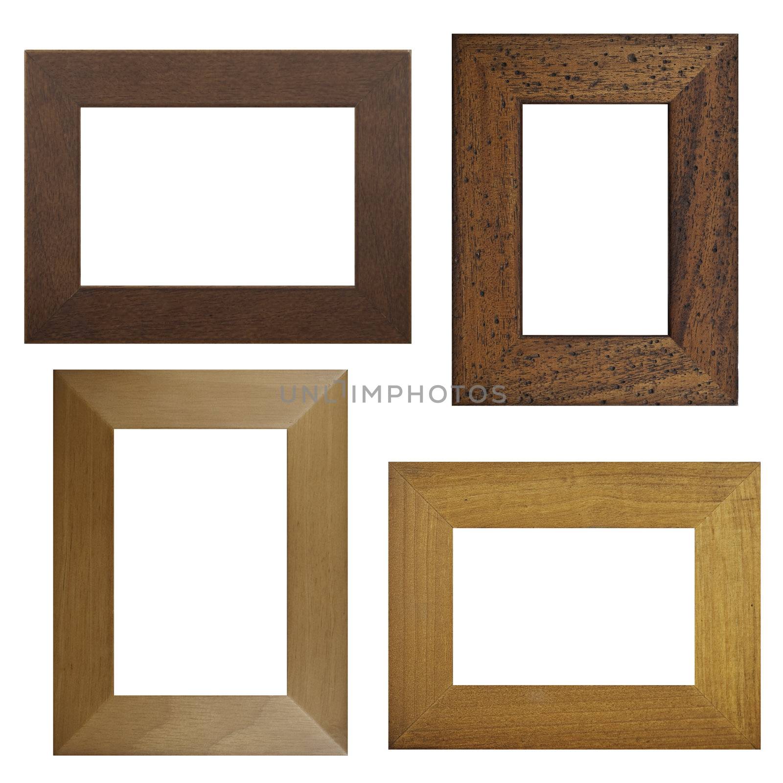 Four antique picture frames isolated on white background.