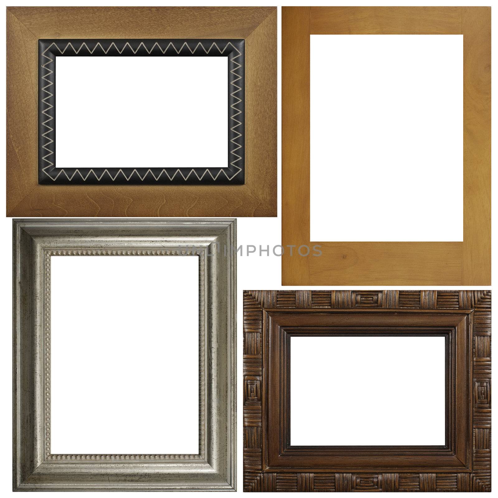 Four antique picture frames isolated on white background.