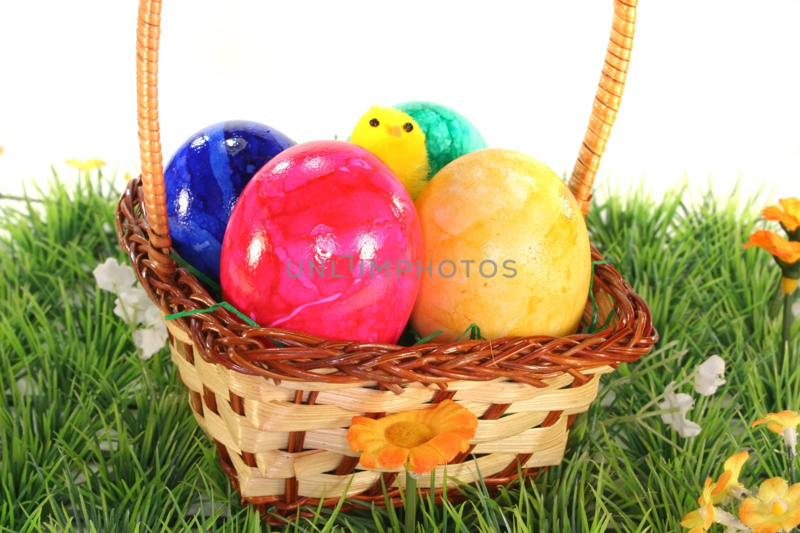 Easter basket with eggs and chicks by discovery