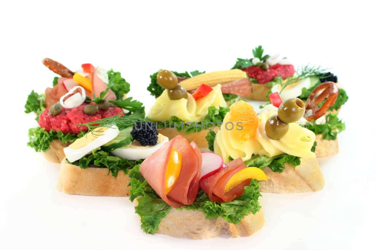 different colored Canapes on a white background