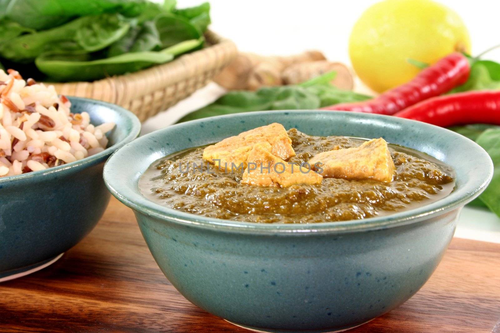 Indian Palak Paneer with rice and fresh ingredients