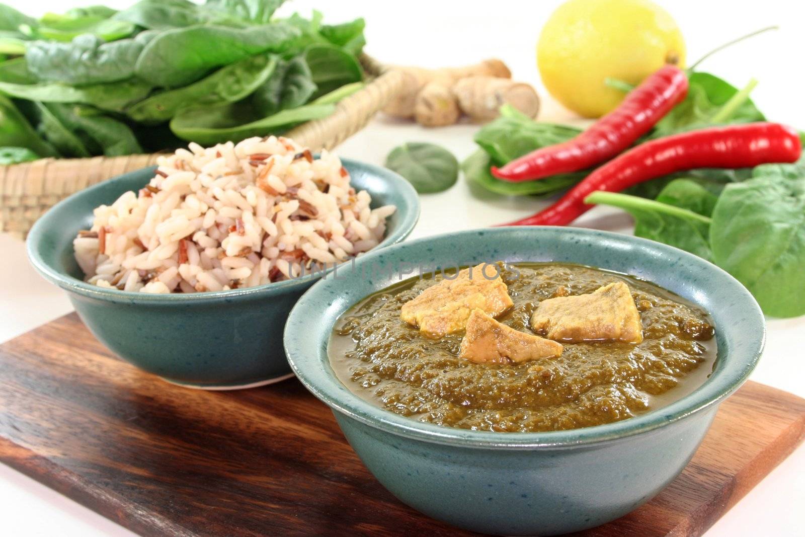 Indian Palak Paneer with rice and fresh ingredients