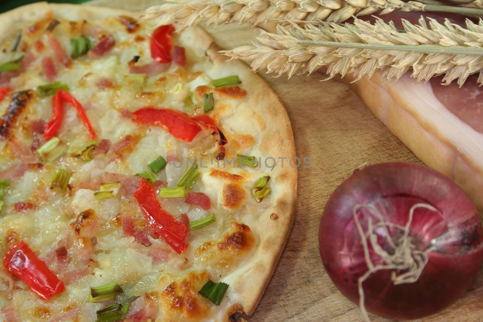 tarte flambee with bacon, green onions and red pepper