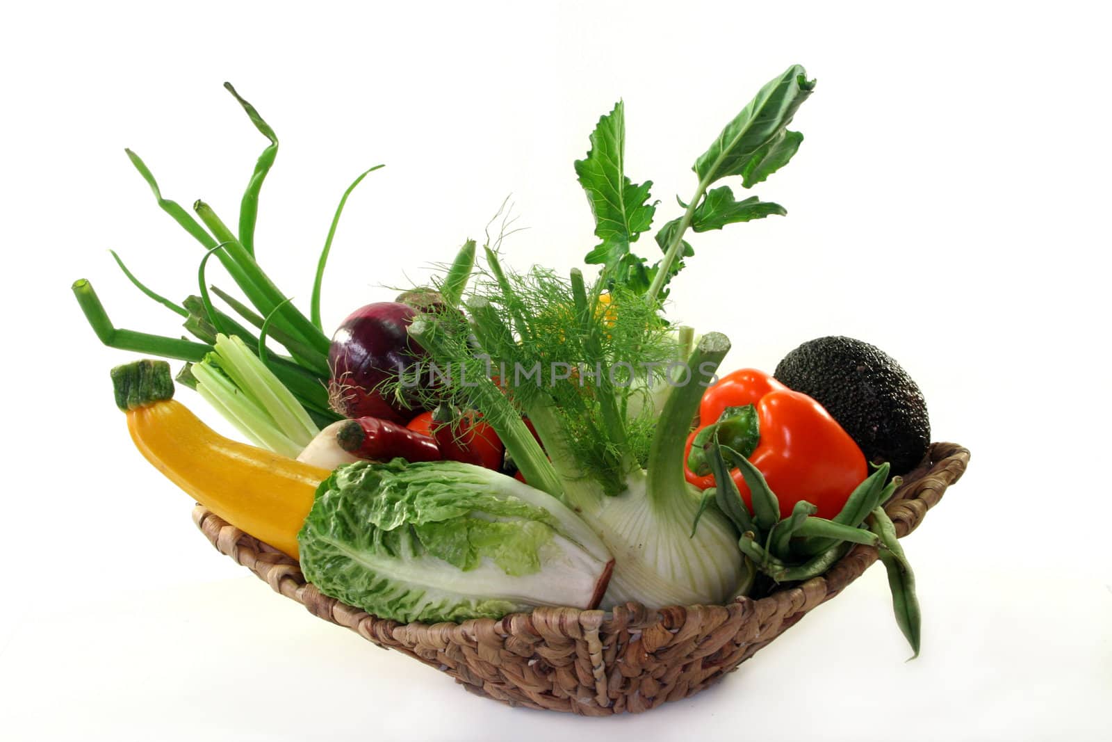 a basket filled with various vegetables