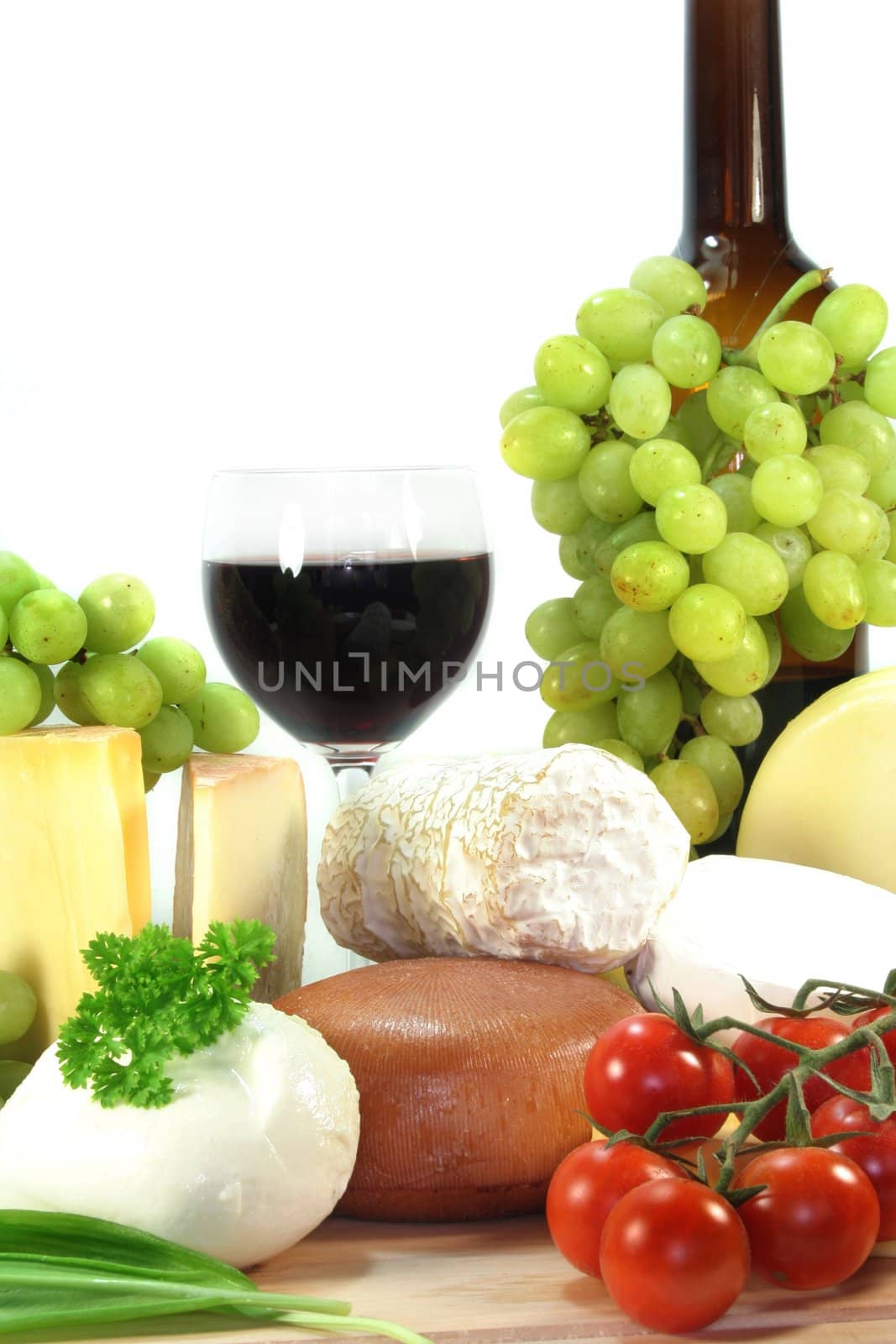 different cheese varieties with bright fresh grapes