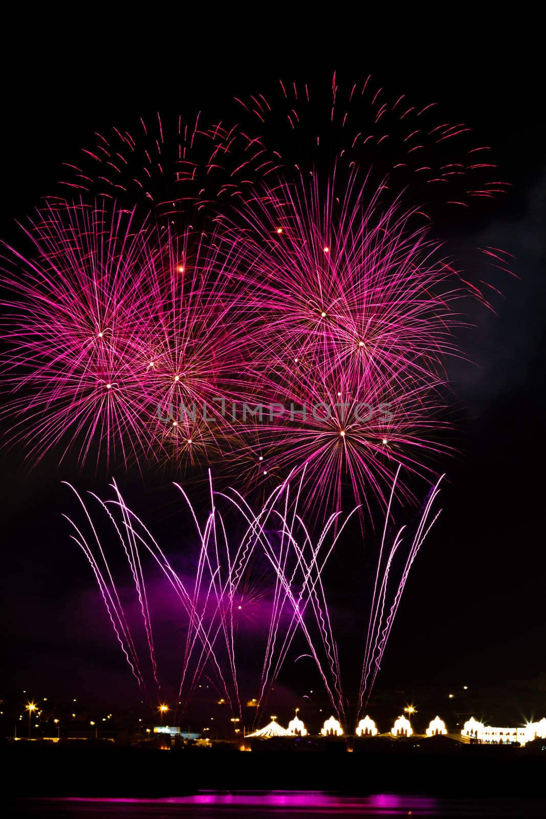 Firework streaks in the night sky