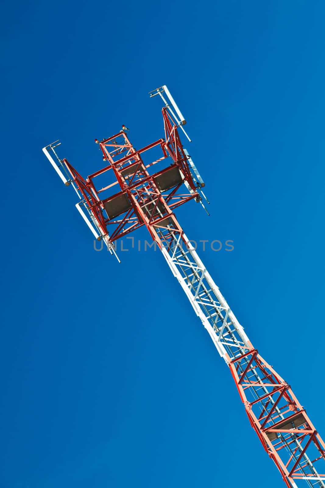 Communications tower with a beautiful blue sky