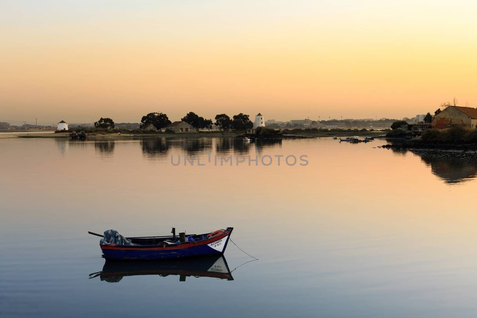 Sunset on the Tejo river with Barreiro mills in background.