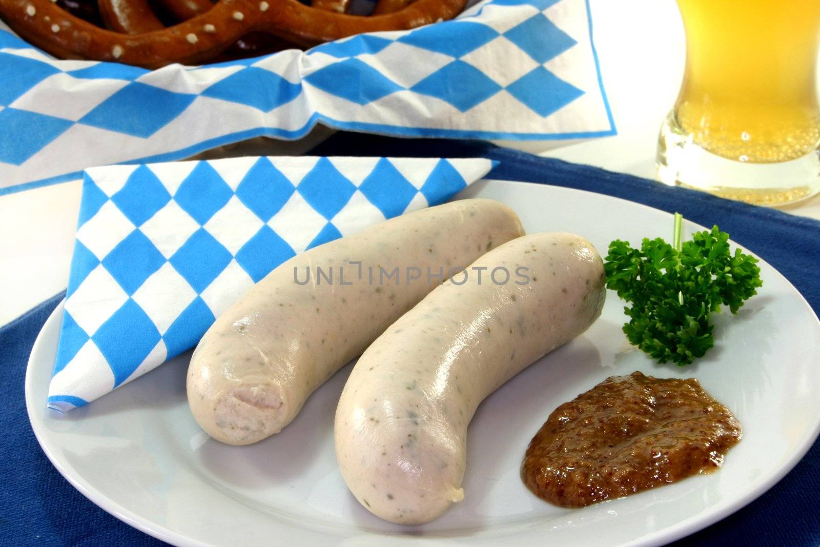 veal sausage with sweet mustard and pretzels