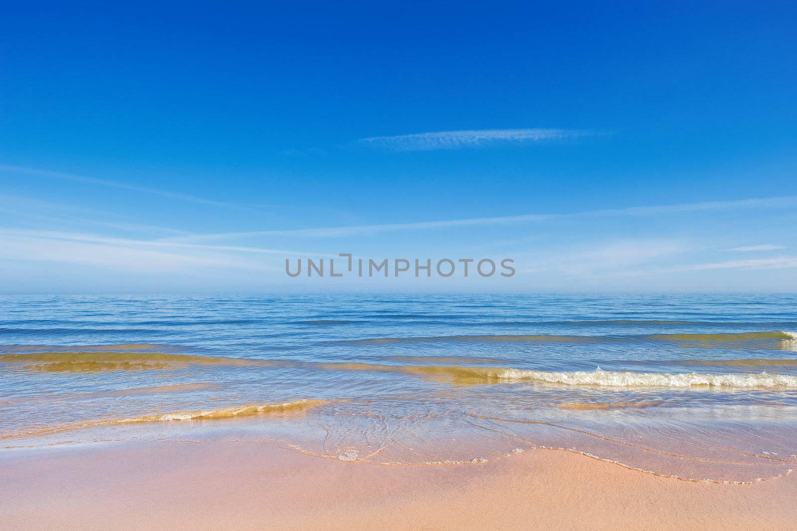Soft wave of the sea on the sandy beach