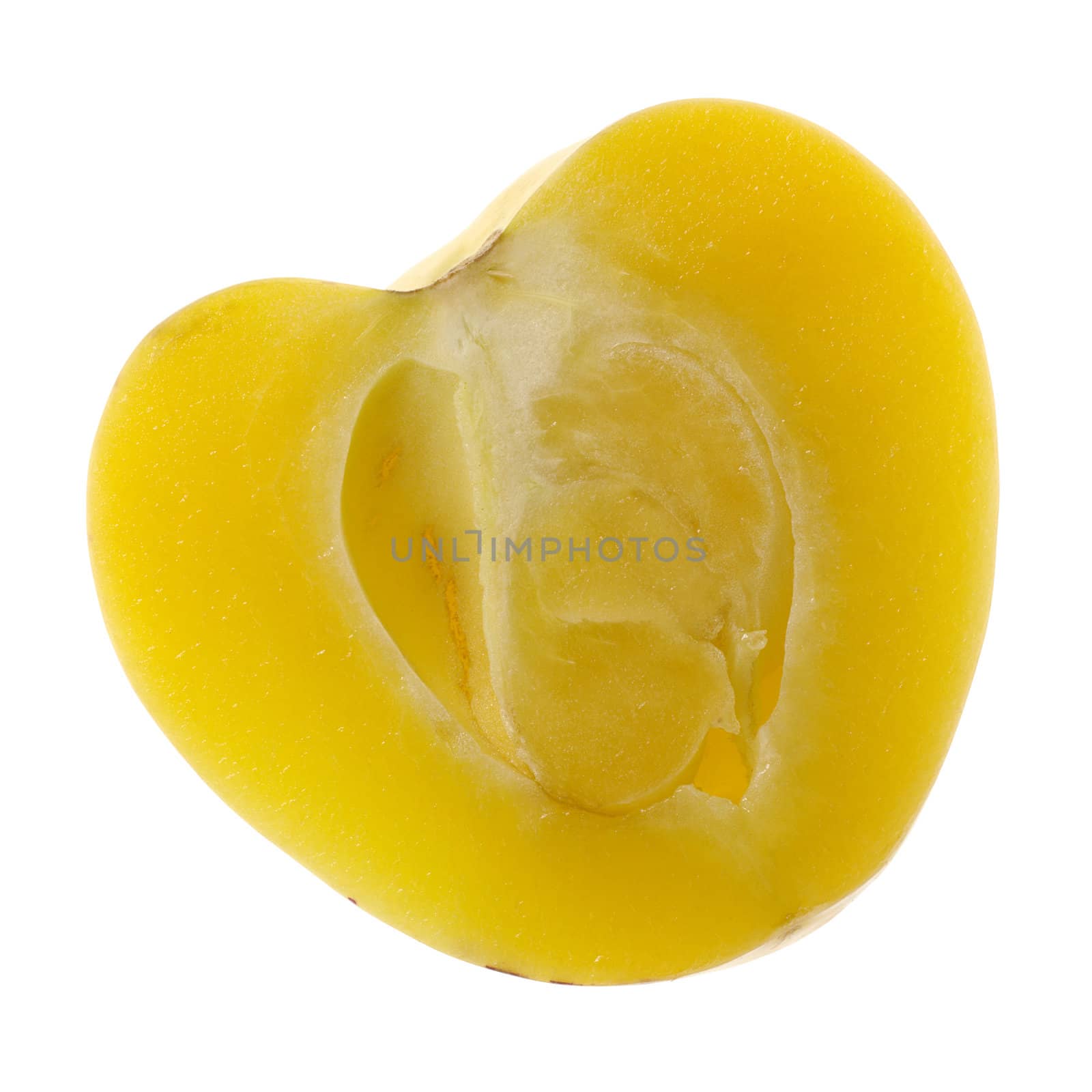 The cross-section of a sweet pepino (lat. Solanum Muricatum), a South American sweet but refreshing cucumber-like fruit, studio isolated on white 
