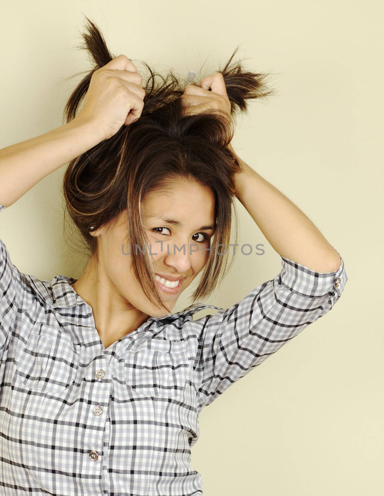 Young Woman Holding Up Her Hair by ildi