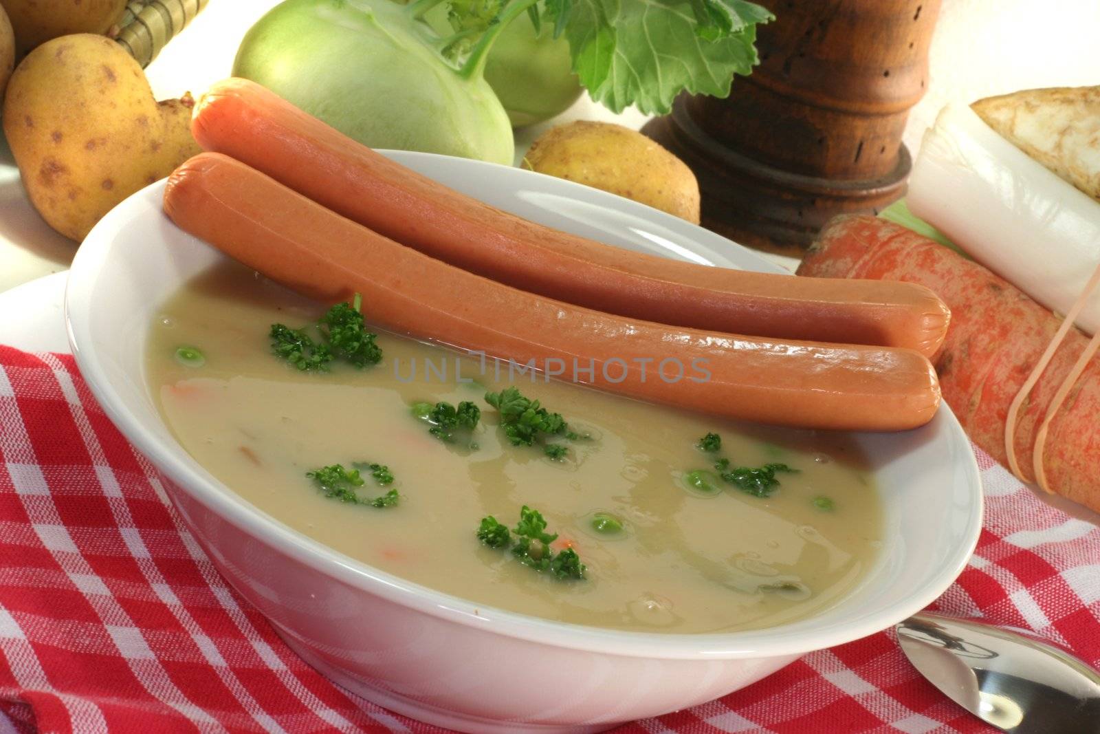Potato soup with fresh parsley and Wiener sausage