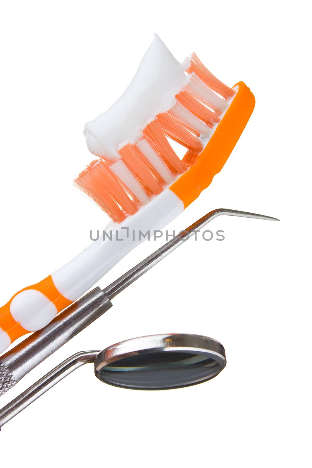 toothbrush and dental tools isolated on white background