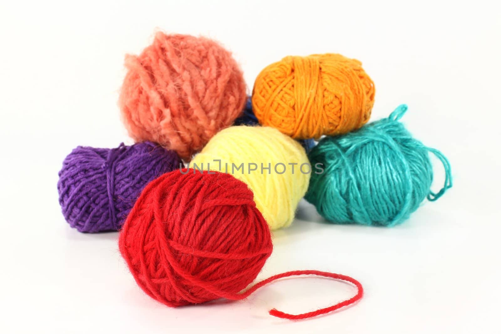 colorful ball of wool on a white background