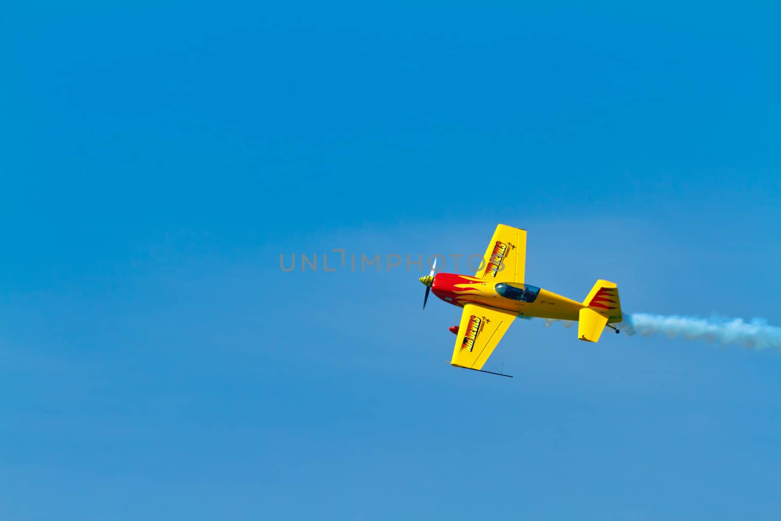 CADIZ, SPAIN-SEP 11: Aircraft Extra 300S of Melissa Pemberton taking part in an exhibition on the 4th airshow of Cadiz on Sep 11, 2011, in Cadiz, Spain