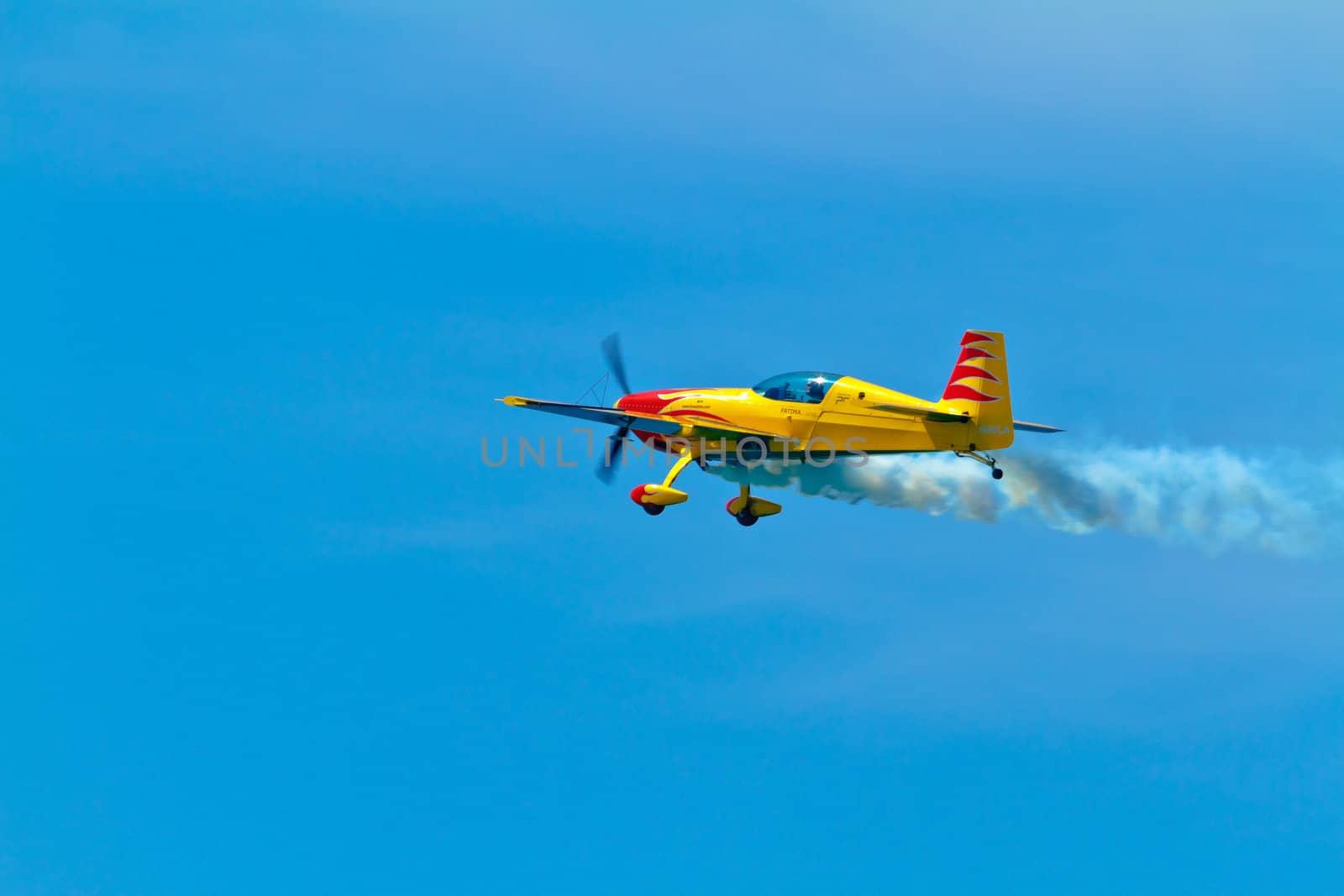 CADIZ, SPAIN-SEP 11: Aircraft Extra 300S of Melissa Pemberton taking part in an exhibition on the 4th airshow of Cadiz on Sep 11, 2011, in Cadiz, Spain