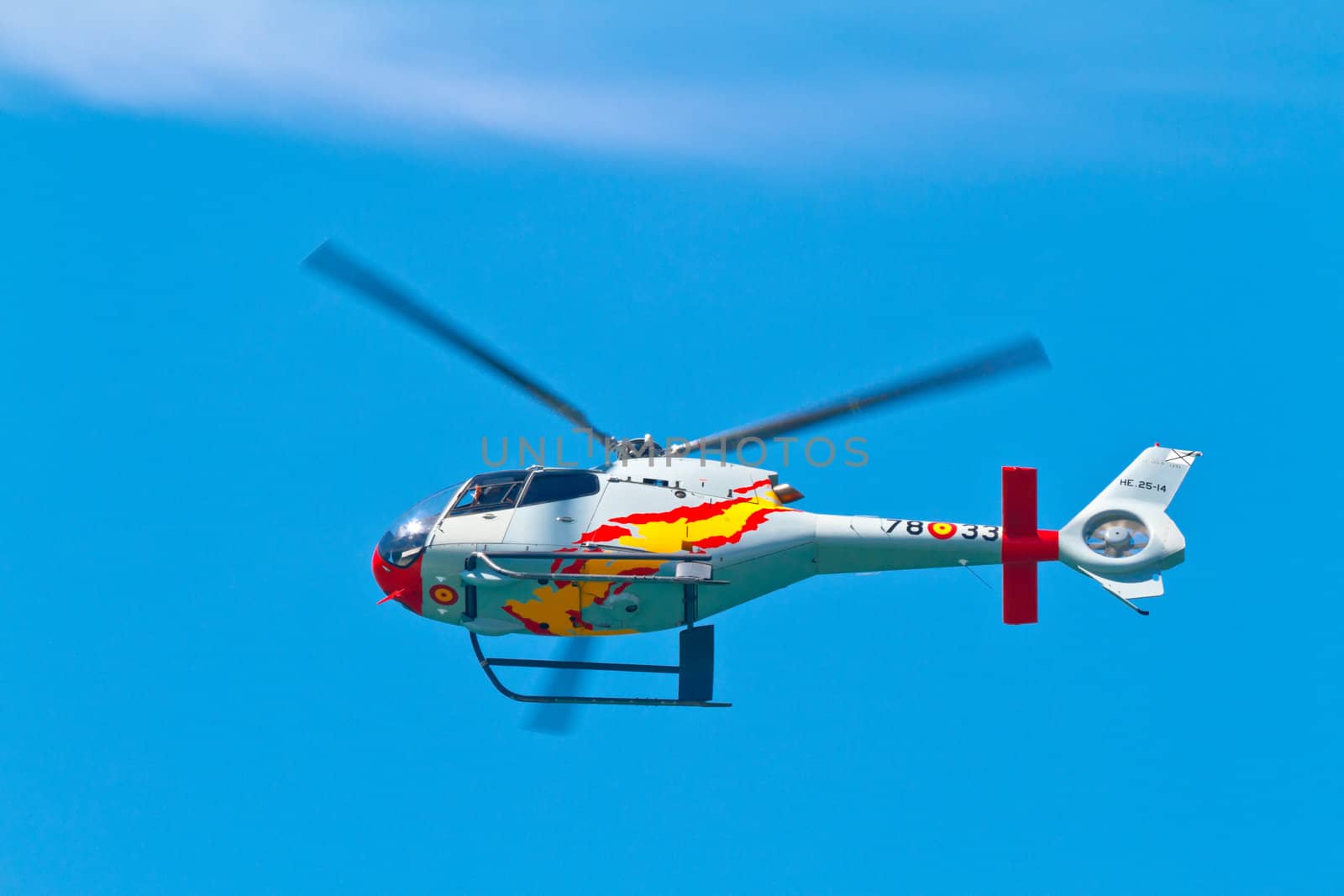 CADIZ, SPAIN-SEP 11: Helicopters of the Patrulla Aspa taking part in an exhibition on the 4th airshow of Cadiz on Sep 11, 2011, in Cadiz, Spain