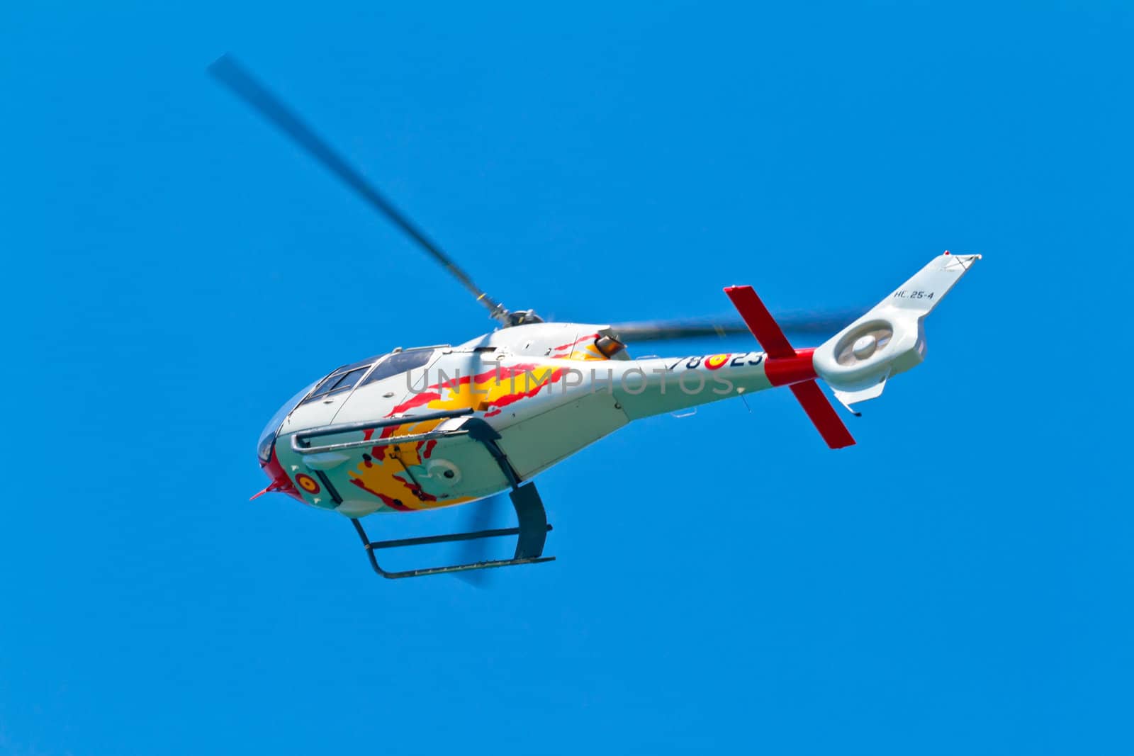 CADIZ, SPAIN-SEP 11: Helicopters of the Patrulla Aspa taking part in an exhibition on the 4th airshow of Cadiz on Sep 11, 2011, in Cadiz, Spain