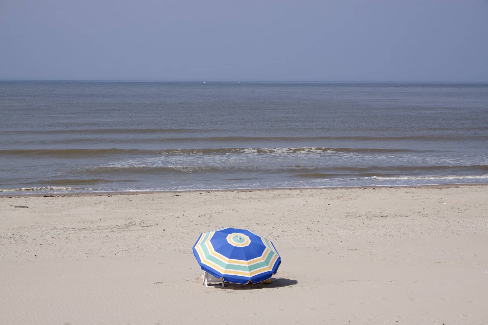 Sunshade  in the sand along the Frenc coast