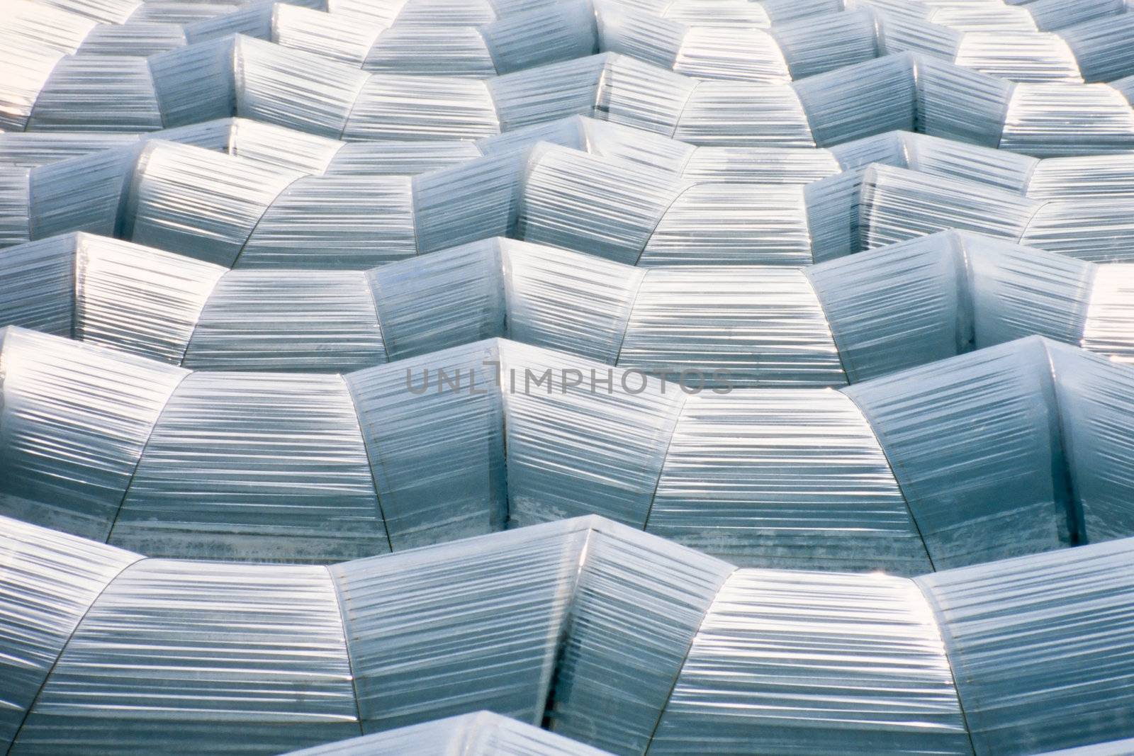 Pattern of endless sea of plastic horticulture greenhouse tunnels for intensive farming of vegetables.