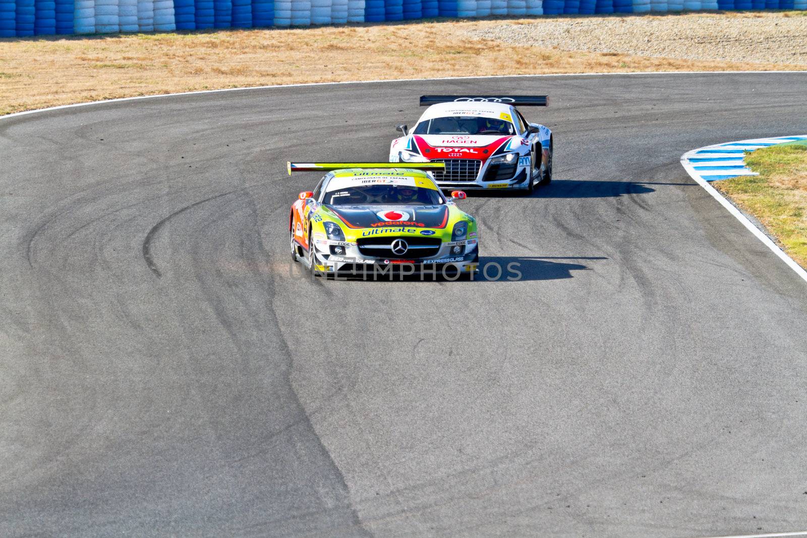 JEREZ DE LA FRONTERA, SPAIN - OCT 16: Jose Pedro Fontes , Mercedes 25 followed by Joao Pedro Figueiredo, Audi 21, races on Iber GT championship on October 16 , 2011, in Jerez de la Frontera , Spain