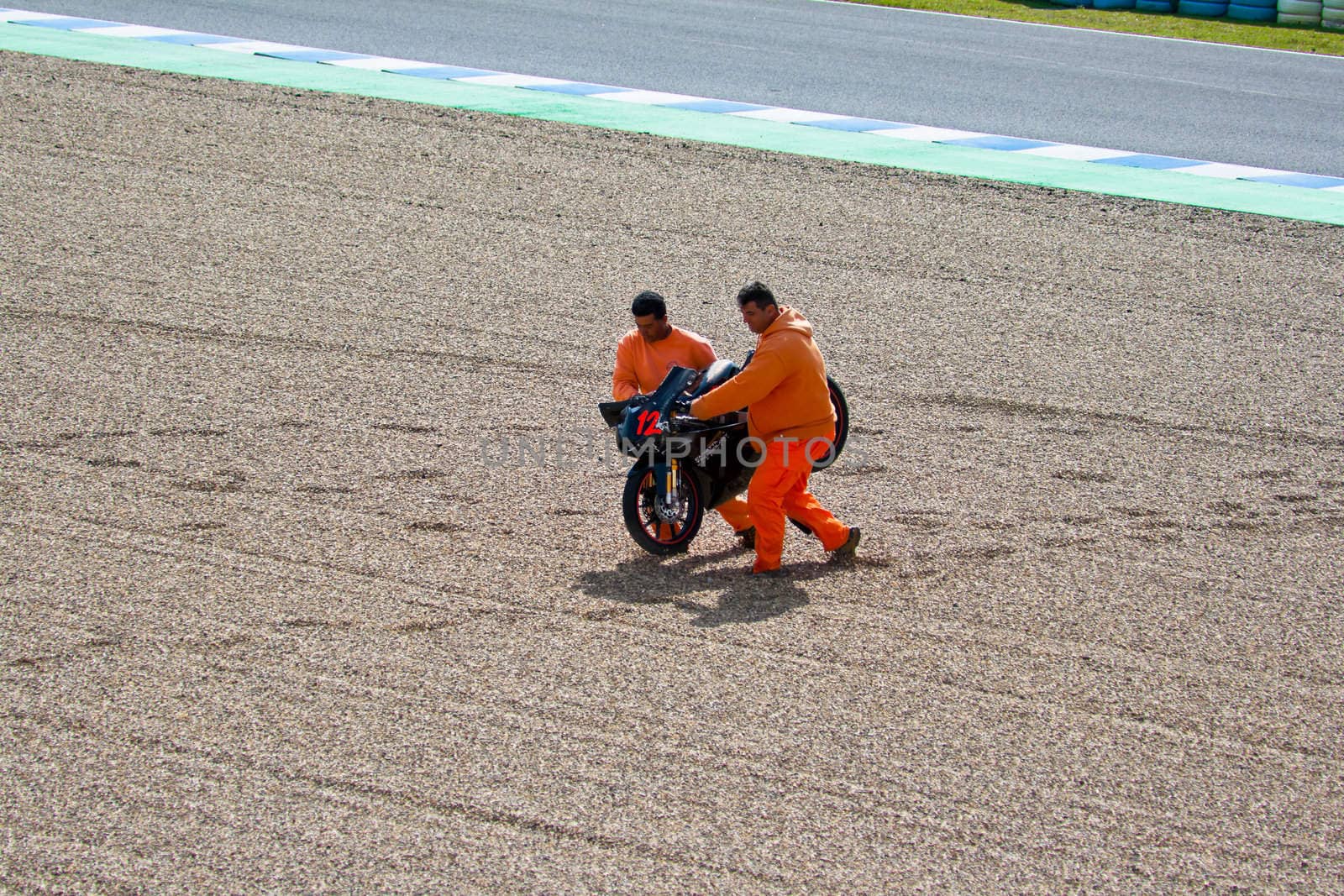 JEREZ DE LA FRONTERA, SPAIN-MAR 5: 125cc motorcycle of Daniel Kartheininge after an accident on the official training of the world championship of MotoGP on March 5,2011 in Jerez de la Frontera, Spain