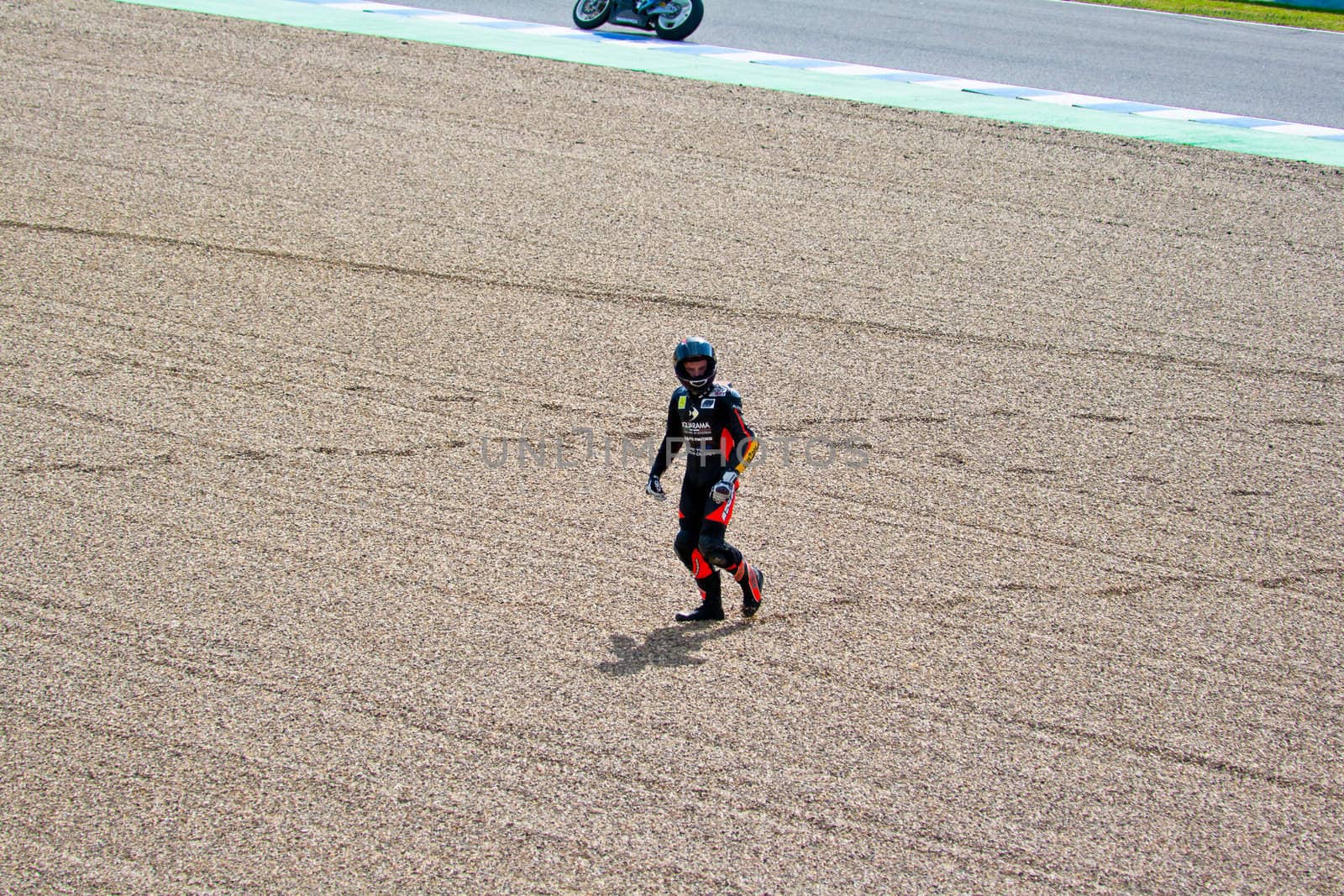 JEREZ DE LA FRONTERA, SPAIN-MAR 5: 125cc motorcyclist Daniel Kartheininge after an accident on the official training of the world championship of MotoGP on March 5, 2011 in Jerez de la Frontera, Spain