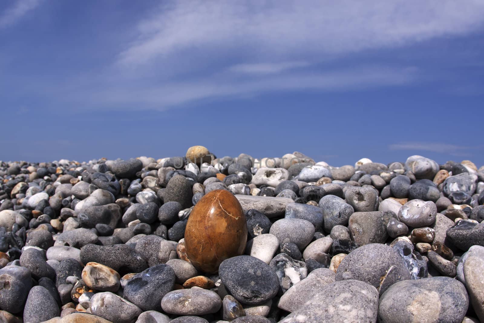 Flintstone on the beach along the coast of Normandie in France