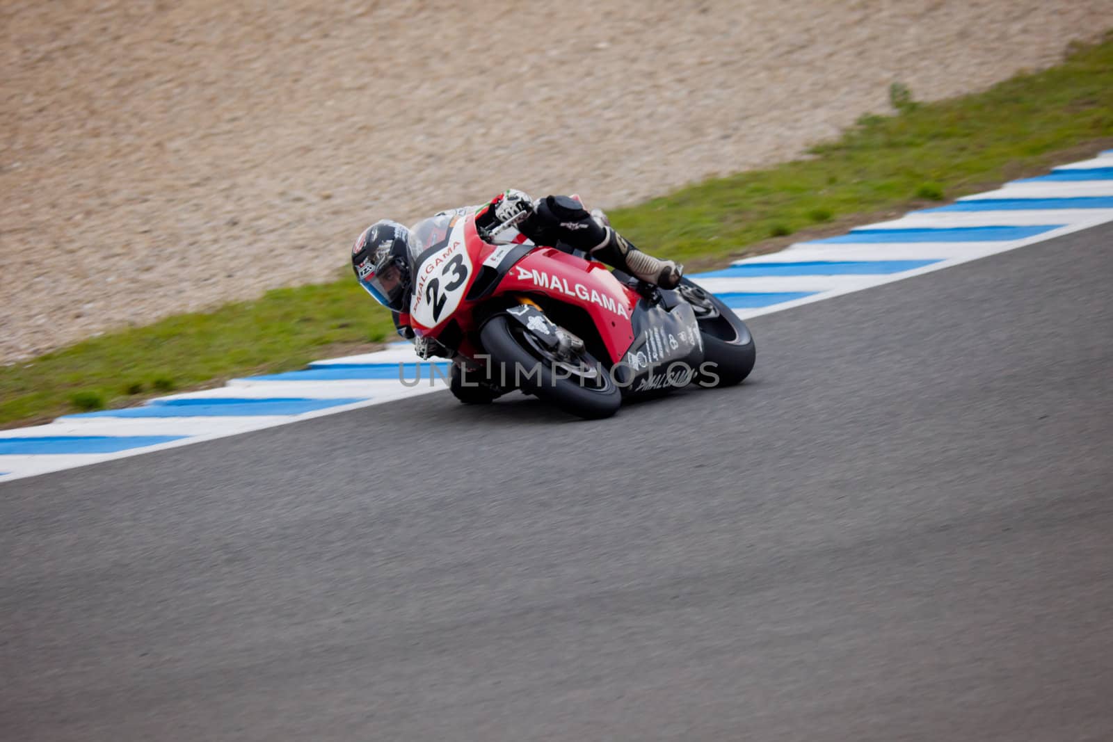 JEREZ DE LA FRONTERA, SPAIN - NOV 20: Stock Extreme motorcyclist Adrian Bonastre takes a curve in the CEV championship on Nov 20, 2010, in Jerez de la Frontera, Spain
