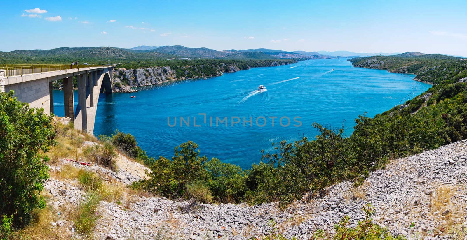 River Krka and bridge in Croatia - travel background. Panorama