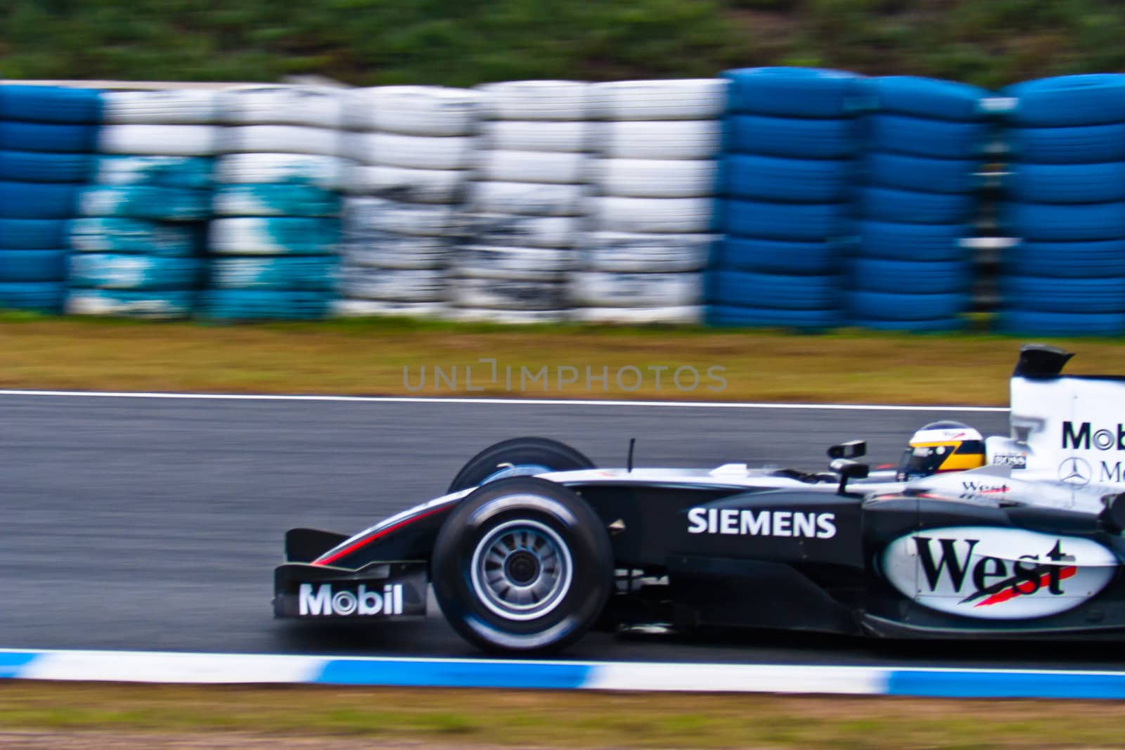 JEREZ DE LA FRONTERA, SPAIN - DEC 04: Pedro de la Rosa of McLaren Mercedes F1 races during a training session on December 04, 2004, in Jerez de la Frontera, Spain