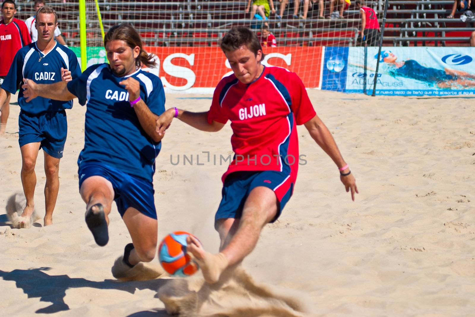 CADIZ, SPAIN -  JUL 30:  Unknown players of the team of Cadiz and Gijon playing the Spanish Championship of Beach Soccer on Jul 30, 2005 on the beach of La Victoria in Cadiz, Spain