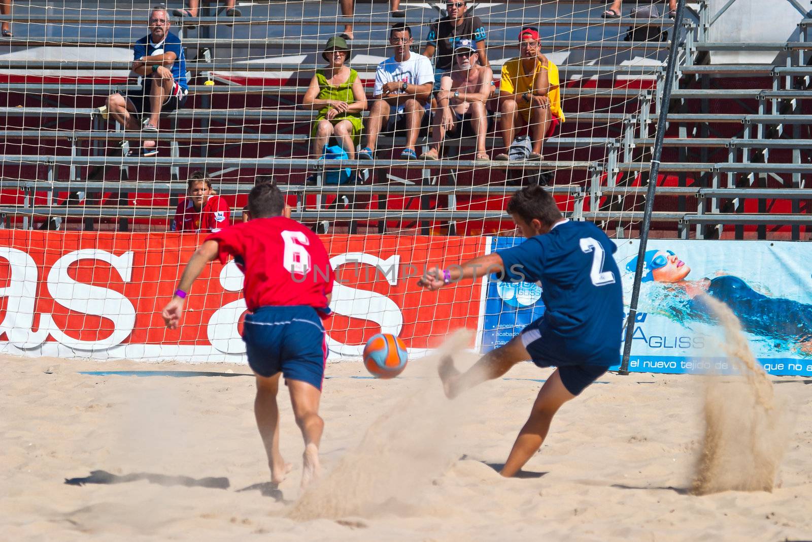 CADIZ, SPAIN -  JUL 30:  Unknown players of the team of Cadiz and Gijon playing the Spanish Championship of Beach Soccer on Jul 30, 2005 on the beach of La Victoria in Cadiz, Spain