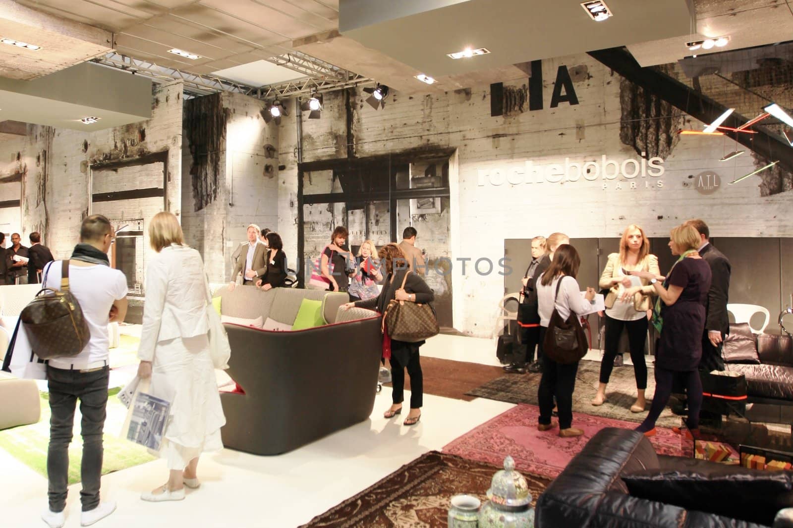 Looking at interior design and architecture solutions during Salone del Mobile 2011, international furnishing accessories tradeshow.