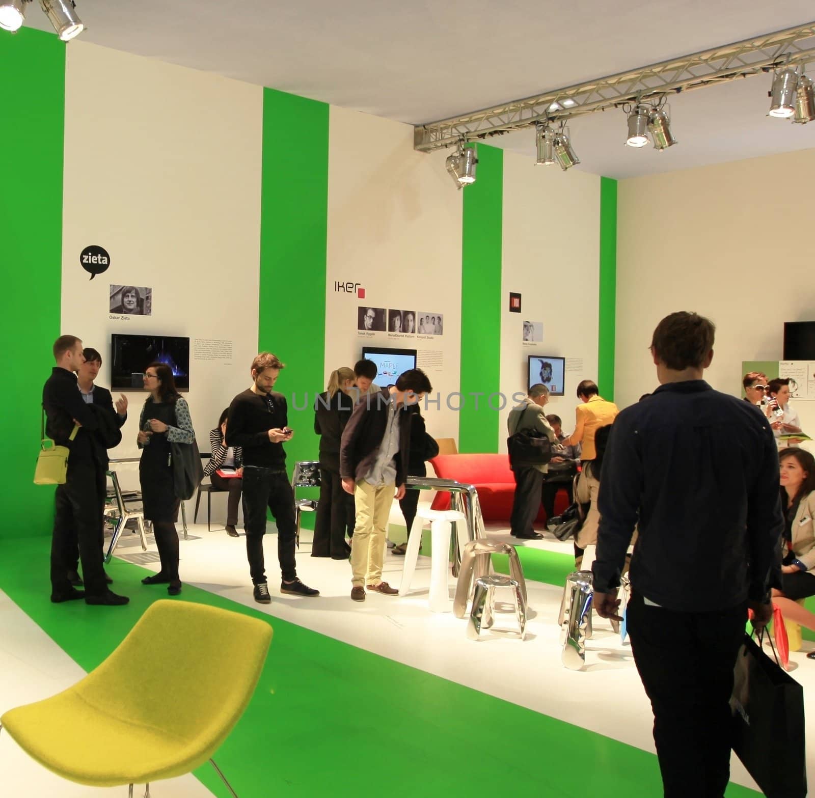 Looking at interior design and architecture solutions during Salone del Mobile 2011, international furnishing accessories tradeshow.