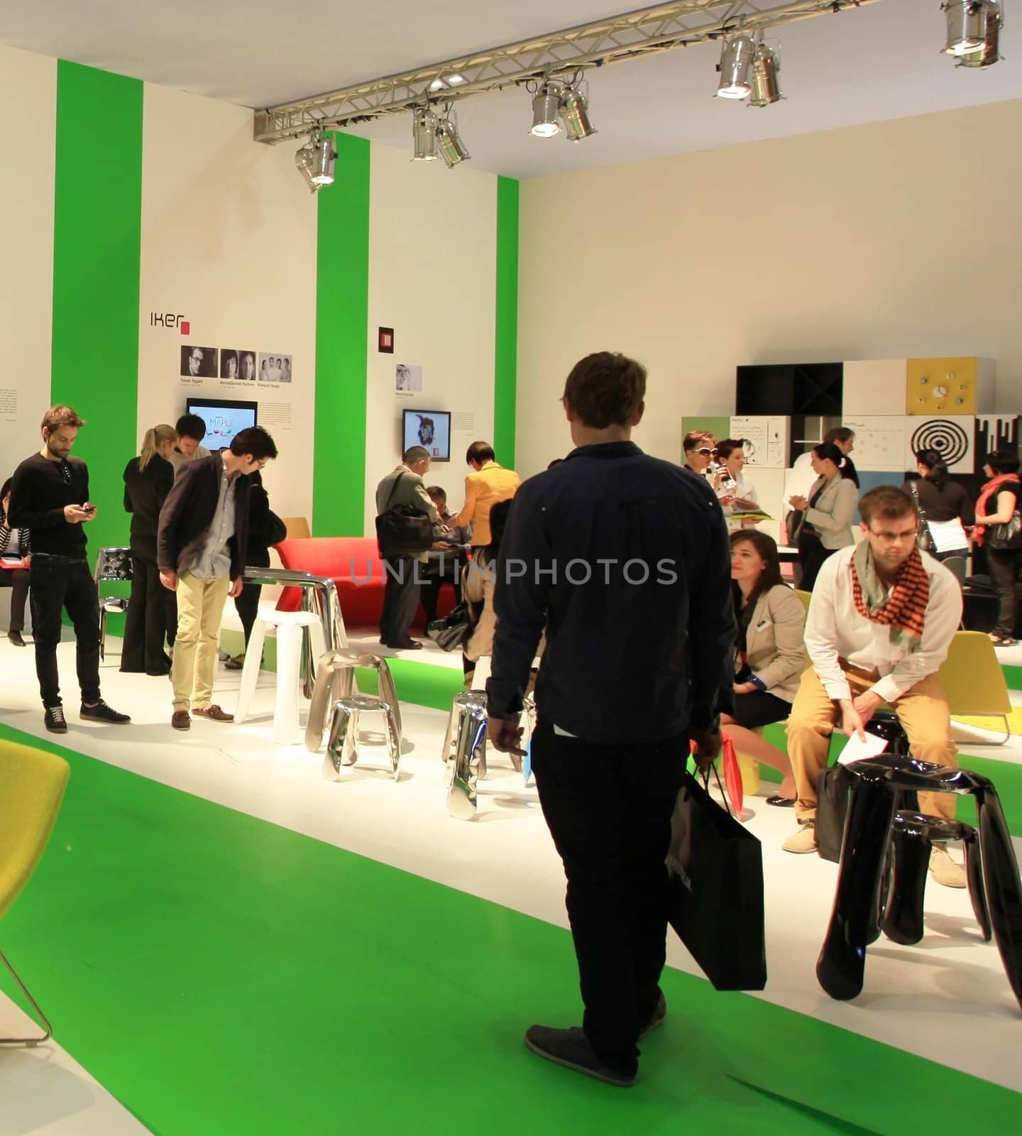 Looking at interior design and architecture solutions during Salone del Mobile 2011, international furnishing accessories tradeshow.