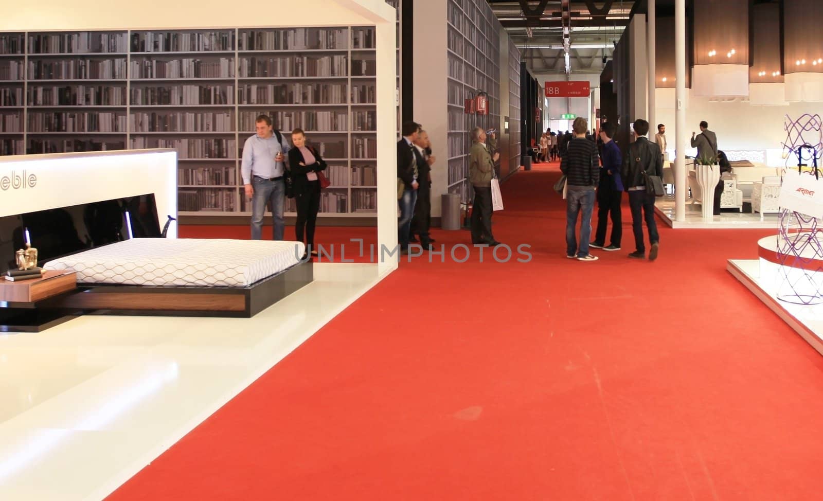 Looking at interior design and architecture solutions during Salone del Mobile 2011, international furnishing accessories tradeshow.