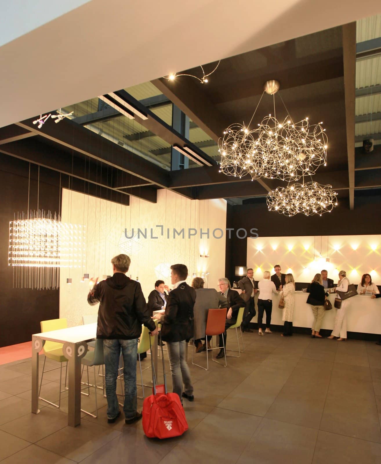 Looking at interior design and architecture solutions during Salone del Mobile 2011, international furnishing accessories tradeshow.