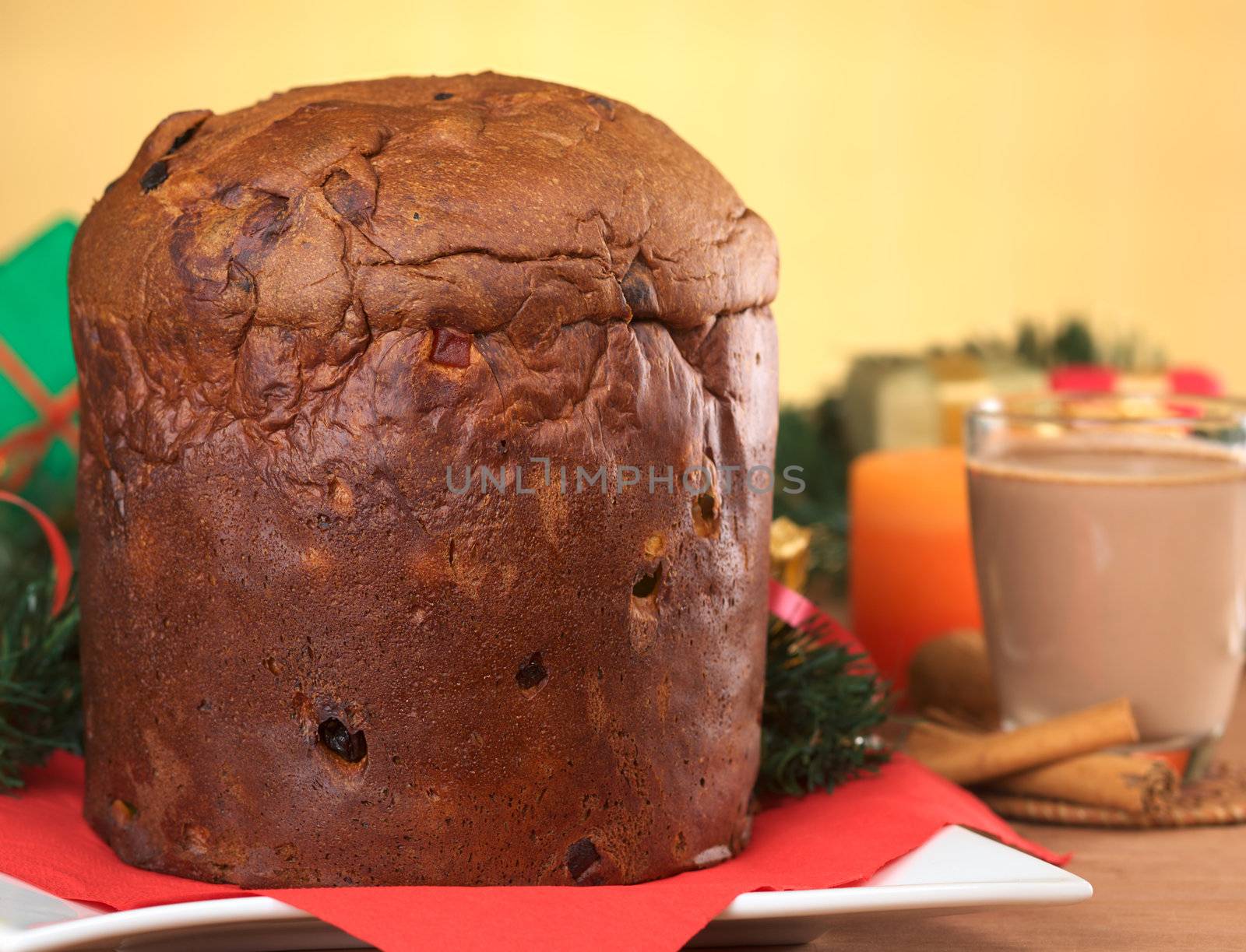 Panettone is a traditional Christmas cake, which is originally from Italy, but is enjoyed now also in many South American countries (Selective Focus, Focus on the front of the cake) 
