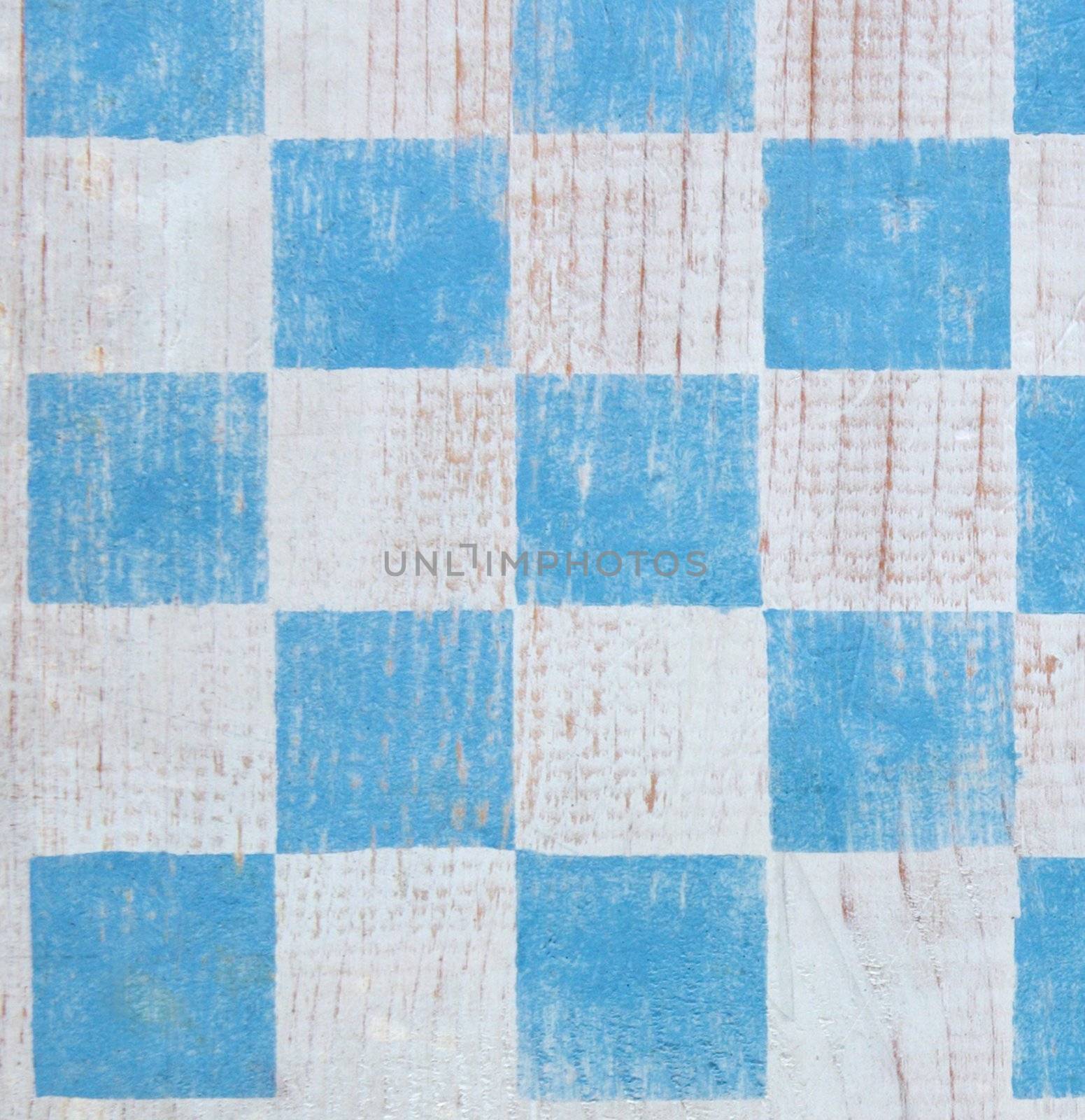 blue stenciled checkerboard useful for a background