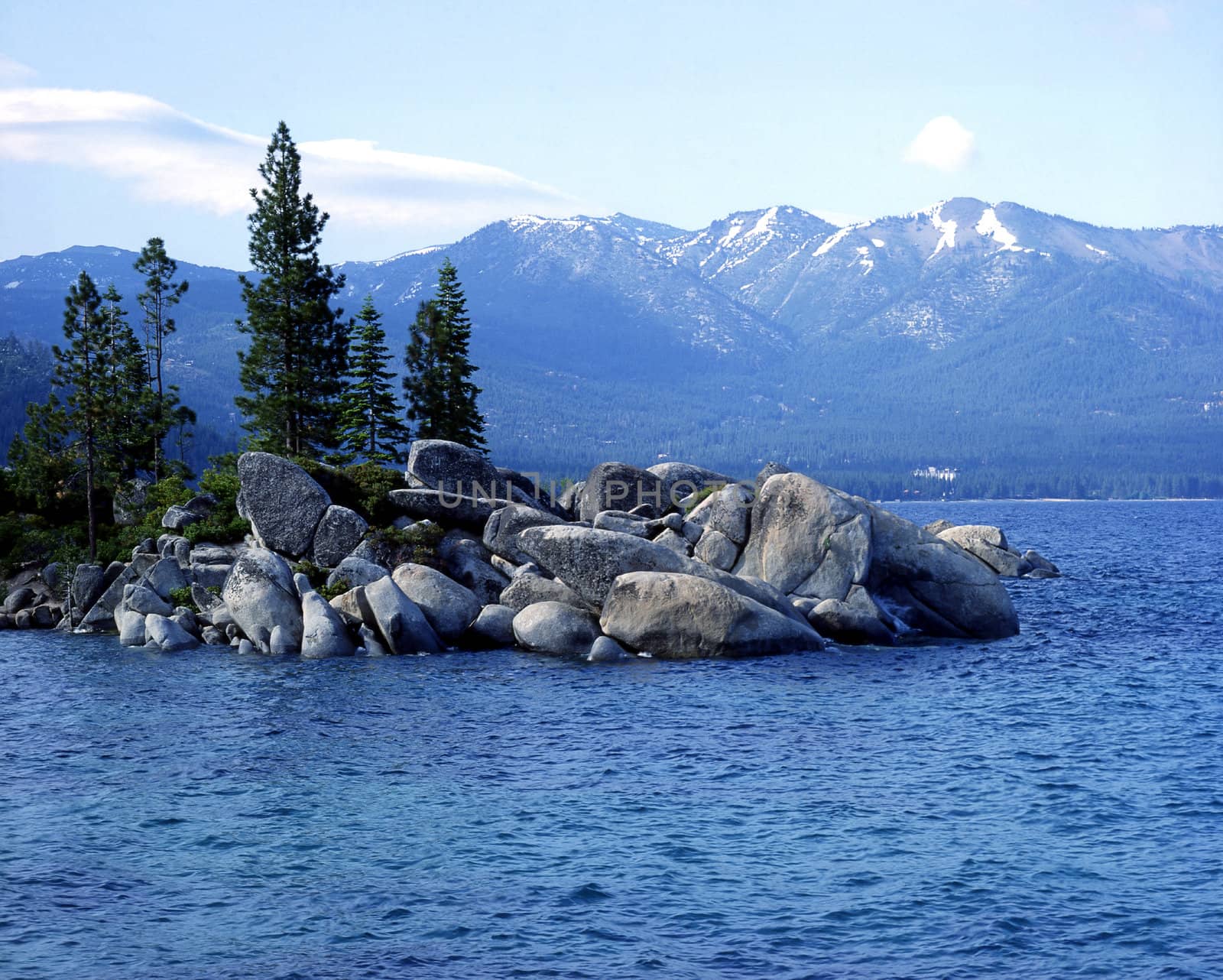Lake Tahoe withisland and mountains in background