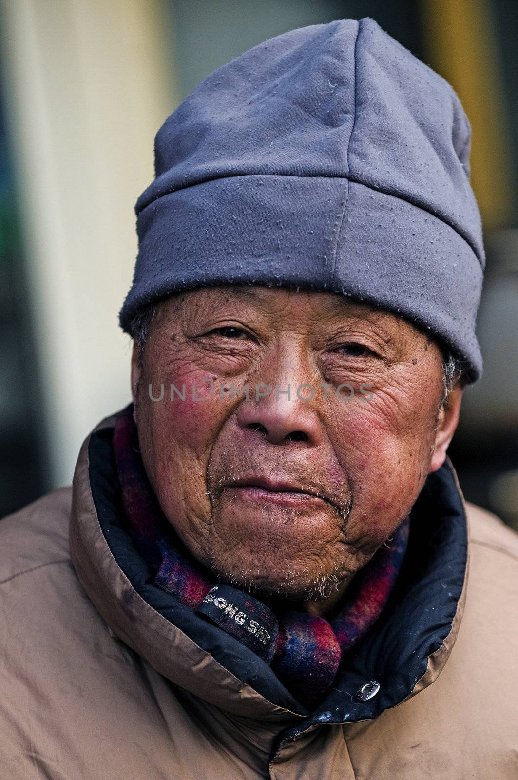 Portrait of old Chinese man in Shanghai China